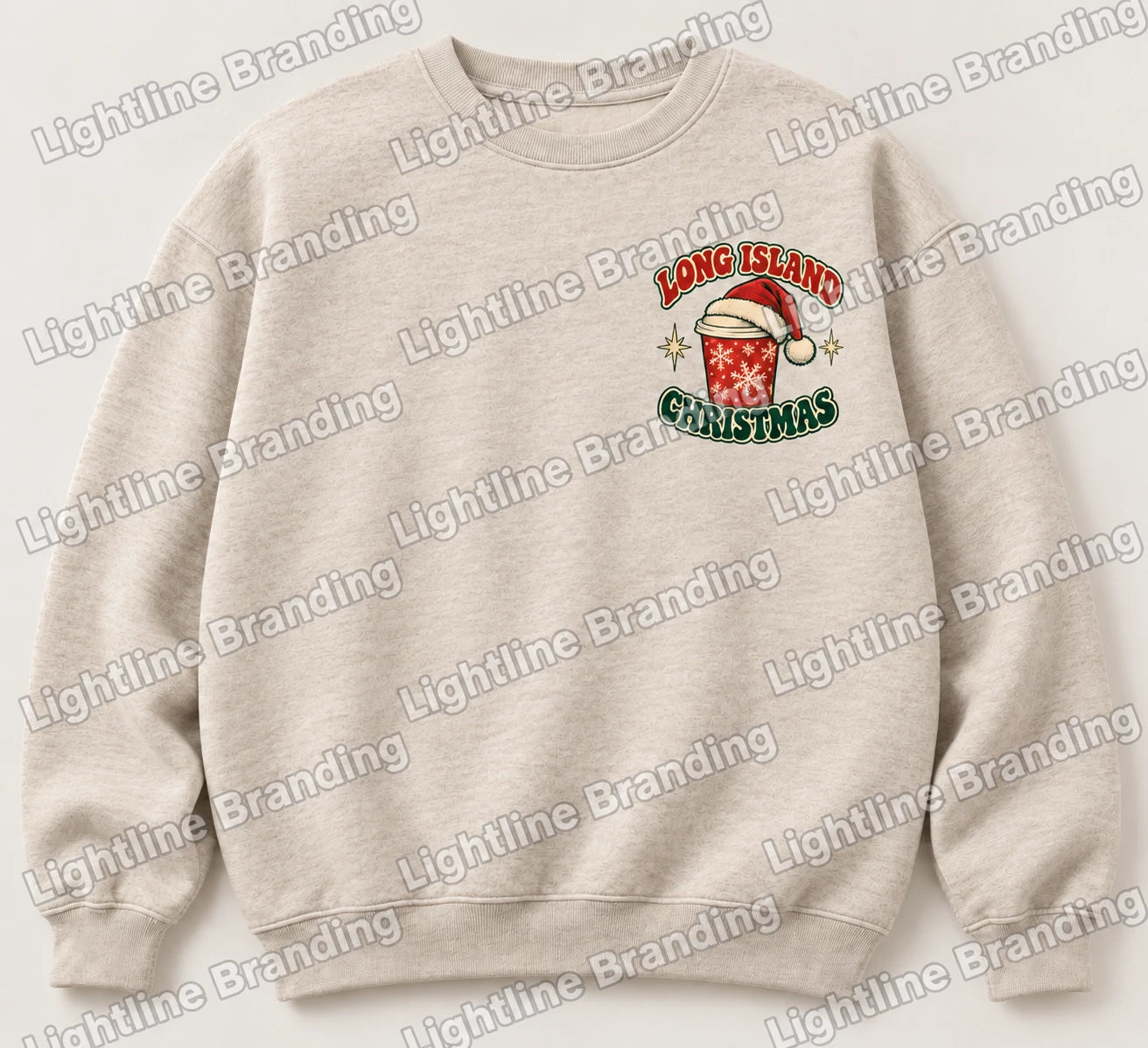 Oatmeal crewneck mockup with a small Long Island Christmas coffee cup chest emblem.