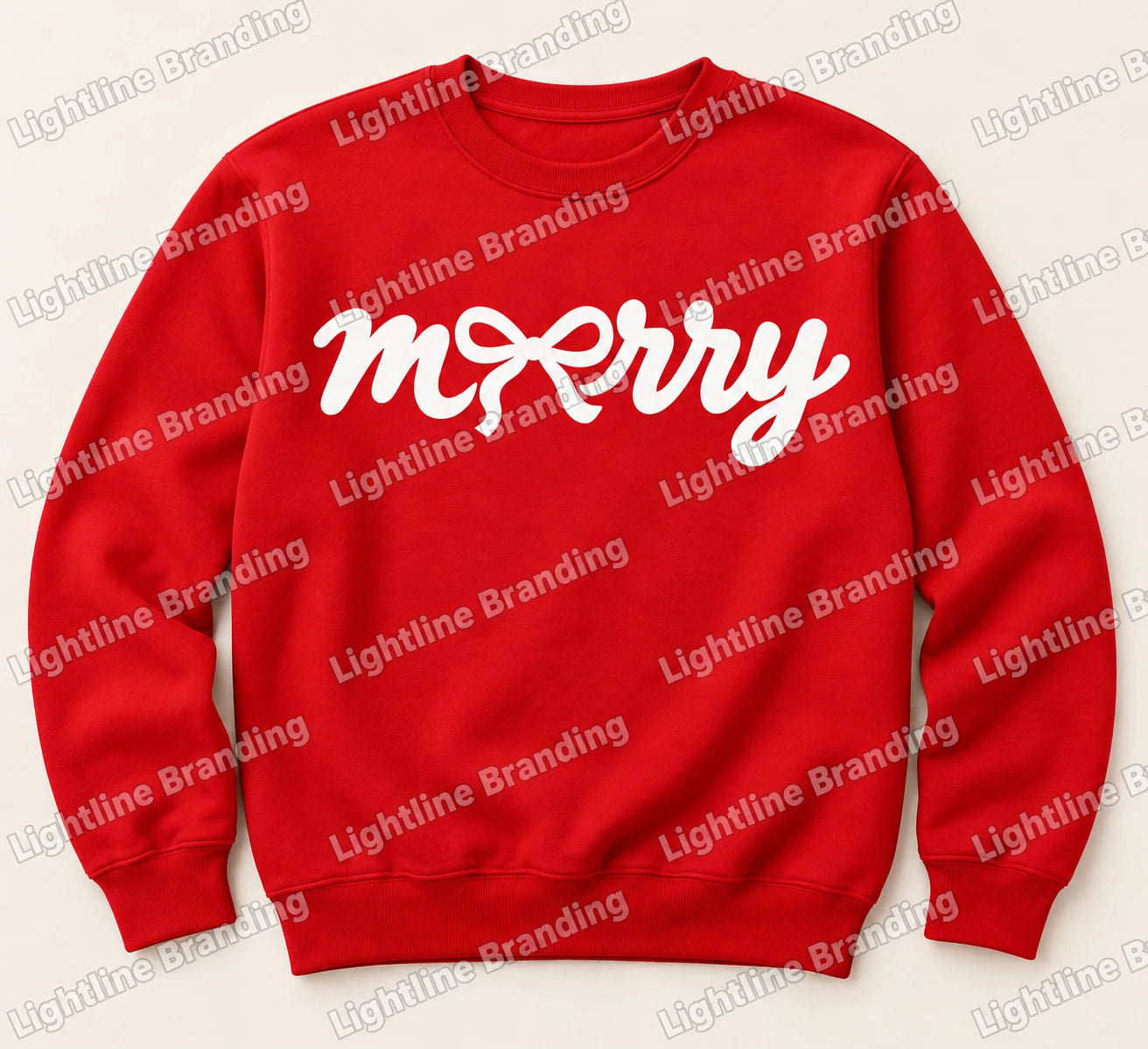 Red crewneck mockup with white merry script and a bow incorporated into the lettering.